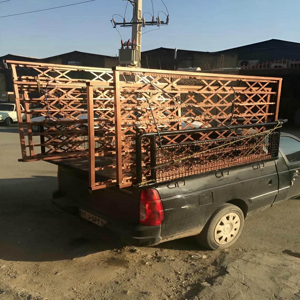 درب حفاظ فلزی ورودی واحد با رنگ کوره‌ای در اهواز