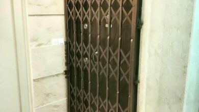 6 طرح درب آکاردئونی مدرن مشکی ورودی اداری در اهواز