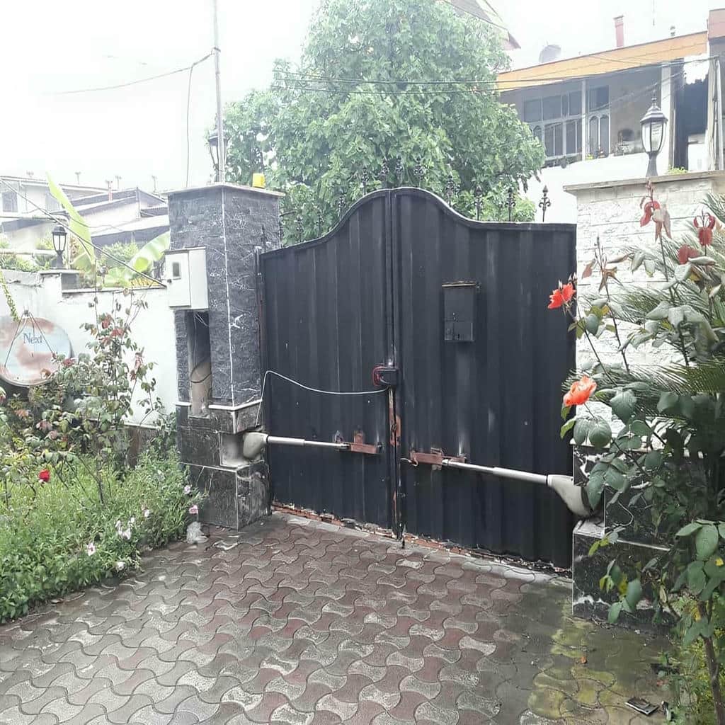 فروش جک درب پارکینگ ایرانی بازویی برای ساختمان مسکونی در اهواز